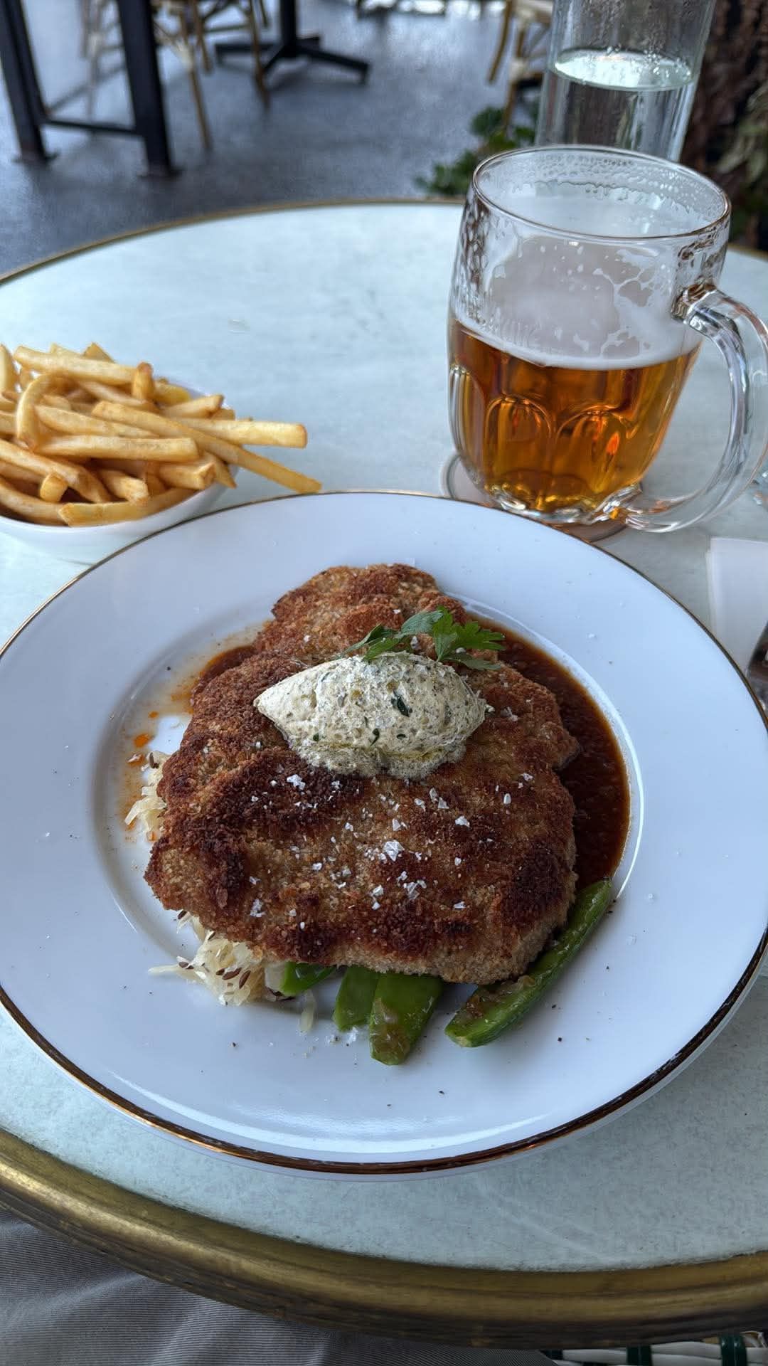 Schnitzel with fries and a beer at Bränneriet